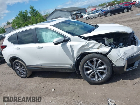 2020 Honda CR-V Touring z VIN 2HKRW2H97LH676151, wystawiony jako IAAI lot #42340956 z przebiegiem 32 492 mil mil oraz . Historia ofert i sprzedaży dostępna na DreamBid. Obrazek 13.