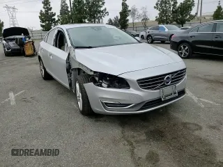 2014 Volvo S60 T5 with VIN YV1612FS4E1292856, listed as a Copart auction lot 50951795 with 121,283 mi miles and Salvage Title. Bid and sale history available at carsss.com. Image 10.