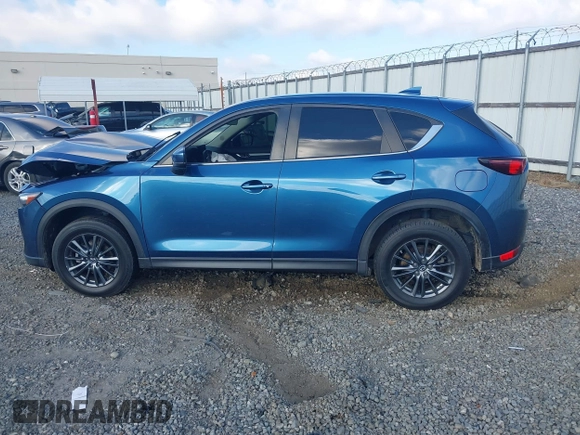 2020 Mazda CX-5 Touring with VIN JM3KFACM0L0775020, listed as a IAAI auction lot 40876970 with 96,424 mi miles. Bid and sale history available at carsss.com. Image 13.