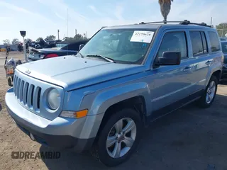 2013 Jeep Patriot Sport with VIN 1C4NJRBB8DD254107, listed as a IAAI auction lot 42170628 with 146,429 mi miles and . Bid and sale history available at carsss.com. Image 2.