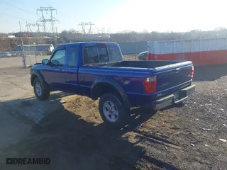 2005 Ford Ranger XLT with VIN 1FTZR45E15PA26369, listed as a IAAI auction lot 41761682 with 115,128 mi miles. Bid and sale history available at carsss.com. Image 3.