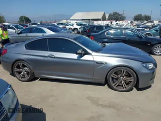 2013 BMW M6 with VIN WBSLX9C51DC968593, listed as a IAAI auction lot 42465979 with 88,010 mi miles and . Bid and sale history available at DreamBid. Image 13.