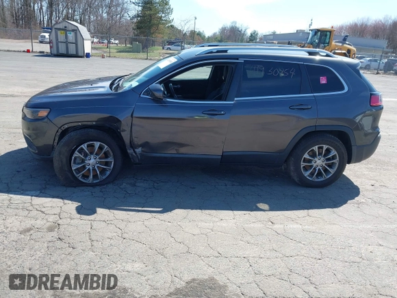 2019 Jeep Cherokee Altitude z VIN 1C4PJMLX5KD456471, wystawiony jako IAAI lot #41930854 z przebiegiem 58 083 mil mil oraz . Historia ofert i sprzedaży dostępna na DreamBid. Obrazek 14.