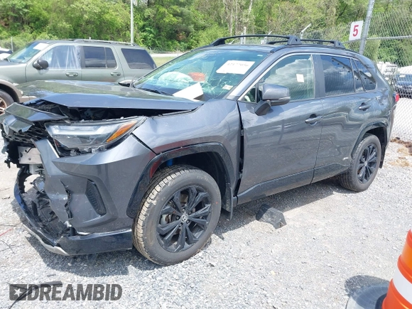 2023 Toyota RAV4 Hybrid SE with VIN JTM16RFV9PD113152, listed as a IAAI auction lot 42177056 with 41,204 mi miles and . Bid and sale history available at DreamBid. Image 2.