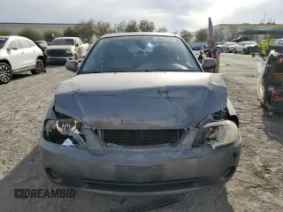 2003 Kia Spectra with VIN KNAFB121935265035, listed as a Copart auction lot 86407934 with 201,586 mi miles and Salvage Title. Bid and sale history available at DreamBid. Image 5.