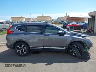 2018 Honda CR-V Touring with VIN 7FARW1H90JE030766, listed as a IAAI auction lot 41637900 with Not Provided miles and . Bid and sale history available at DreamBid. Image 13.