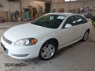 2013 Chevrolet Impala LT with VIN 2G1WB5E31D1164929, listed as a IAAI auction lot 42091934 with 67,218 mi miles and . Bid and sale history available at DreamBid. Image 2.