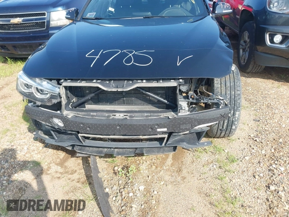 2018 BMW 3 Series 330i xDrive with VIN WBA8D9C54JEM31381, listed as a IAAI auction lot 41904785 with 64,796 mi miles and . Bid and sale history available at DreamBid. Image 6.