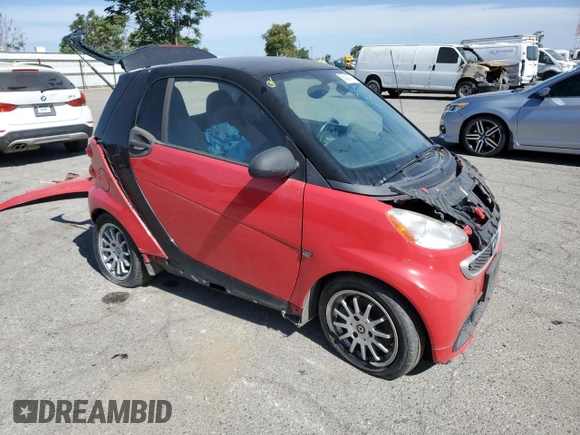 2014 Smart fortwo Pure z VIN WMEEJ3BA6EK745679, wystawiony jako Copart lot #56242784 z przebiegiem 86 991 mil mil oraz Szkoda całkowita • Salvage title. Historia ofert i sprzedaży dostępna na DreamBid. Obrazek 4.