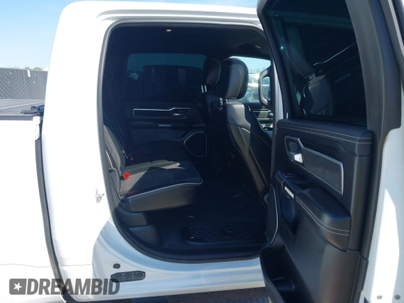 2023 Ram 1500 Laramie with VIN 1C6SRFJT0PN508550, listed as a IAAI auction lot 41913849 with 57,765 mi miles and . Bid and sale history available at DreamBid. Image 8.