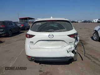 2017 Mazda CX-5 Sport with VIN JM3KFABL5H0124725, listed as a IAAI auction lot 40487298 with 103,889 mi miles. Bid and sale history available at carsss.com. Image 16.
