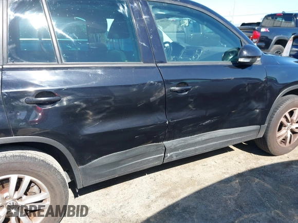 2012 Volkswagen Tiguan LE with VIN WVGAV7AX1CW557250, listed as a IAAI auction lot 42300694 with 122,310 mi miles and . Bid and sale history available at DreamBid. Image 6.