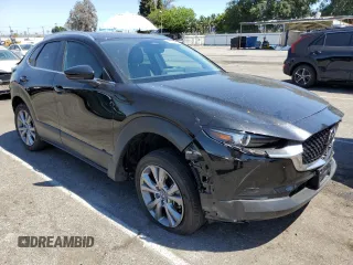 2024 Mazda CX-30 S Preferred with VIN 3MVDMBCM2RM637657, listed as a Copart auction lot 56426575 with 14,500 mi miles and Salvage title. Bid and sale history available at DreamBid. Image 4.