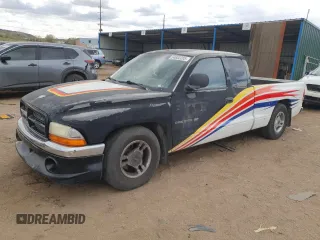 1999 Dodge Dakota SLT z VIN 1B7GL22X4XS193831, wystawiony jako Copart lot #54602285 z przebiegiem 150 246 mil mil oraz Szkoda całkowita • Salvage title. Historia ofert i sprzedaży dostępna na DreamBid. Obrazek 1.