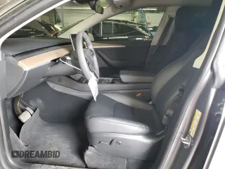 2024 Tesla Model Y Long Range with VIN 7SAYGDEE2RA299824, listed as a Copart auction lot 56040835 with 16,534 mi miles and Salvage title. Bid and sale history available at DreamBid. Image 7.