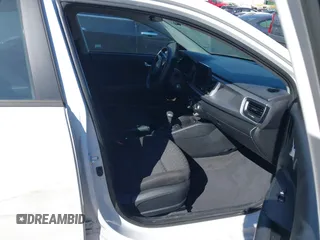 2022 Kia Rio S with VIN 3KPA24AD4NE434315, listed as a IAAI auction lot 41709976 with 65,000 mi miles and . Bid and sale history available at carsss.com. Image 5.