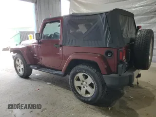 2010 Jeep Wrangler Sahara z VIN 1J4GA5D11AL106768, wystawiony jako Copart lot #56935745 z przebiegiem 143 212 mil mil oraz Szkoda całkowita • Salvage title. Historia ofert i sprzedaży dostępna na DreamBid. Obrazek 2.