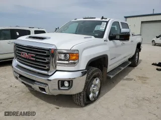 2018 GMC Sierra 3500HD SLT with VIN 1GT42XCY3JF154559, listed as a Copart auction lot 50743385 with 165,332 mi miles and Salvage Title. Bid and sale history available at carsss.com. Image 1.