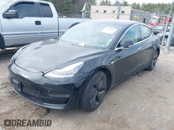 2018 Tesla Model 3 Long Range Battery z VIN 5YJ3E1EB3JF127410, wystawiony jako IAAI lot #41994858 z przebiegiem 100 494 mil mil oraz . Historia ofert i sprzedaży dostępna na DreamBid. Obrazek 2.