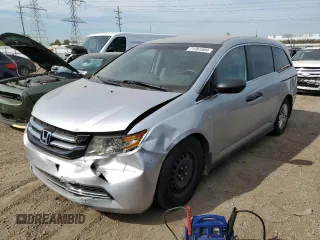 2014 Honda Odyssey LX with VIN 5FNRL5H2XEB135917, listed as a Copart auction lot 79043514 with 329,233 mi miles and Salvage Title. Bid and sale history available at carsss.com. Image 1.