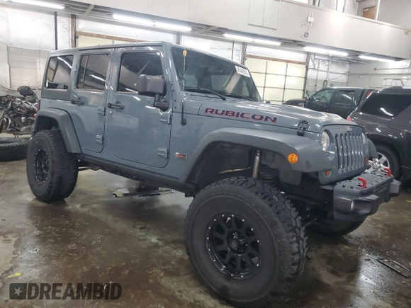 2013 Jeep Wrangler Unlimited Rubicon with VIN 1C4BJWFG7DL691514, listed as a Copart auction lot 42449245 with 114,640 mi miles and Salvage Title. Bid and sale history available at carsss.com. Image 4.