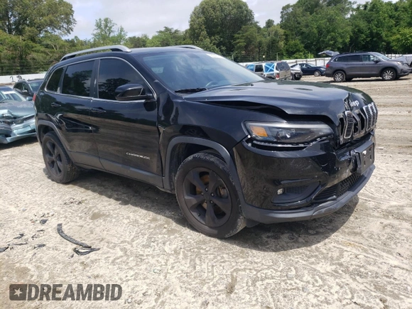 2019 Jeep Cherokee Latitude Plus with VIN 1C4PJMLB7KD101158, listed as a Copart auction lot 58246115 with 144,807 mi miles and Salvage title. Bid and sale history available at DreamBid. Image 4.