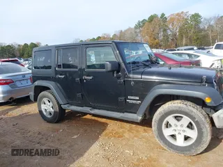 2017 Jeep Wrangler Unlimited Sport with VIN 1C4BJWDG7HL745466, listed as a IAAI auction lot 41040828 with 86,269 mi miles. Bid and sale history available at carsss.com. Image 13.