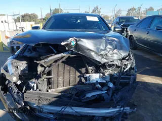 2019 BMW 5 Series 530e with VIN WBAJA9C57KB399541, listed as a IAAI auction lot 41656775 with 96,523 mi miles and . Bid and sale history available at DreamBid. Image 12.