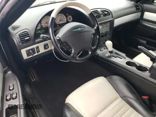 2003 Ford Thunderbird Deluxe with VIN 1FAHP60A03Y108186, listed as a Copart auction lot 86729574 with 79,624 mi miles and Salvage Title. Bid and sale history available at DreamBid. Image 8.