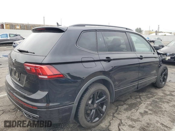 2023 Volkswagen Tiguan SE R-Line Black z VIN 3VVCB7AXXPM033818, wystawiony jako Copart lot #48759425 z przebiegiem 24 260 mil mil oraz Szkoda całkowita • Salvage title. Historia ofert i sprzedaży dostępna na DreamBid. Obrazek 3.