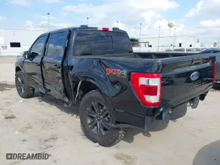 2022 Ford F-150 XL with VIN 1FTFW1E84NFA69310, listed as a IAAI auction lot 41471308 with 71,584 mi miles. Bid and sale history available at carsss.com. Image 3.