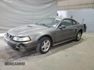 2001 Ford Mustang Standard with VIN 1FAFP40401F171965, listed as a Copart auction lot 58734015 with 154,775 mi miles and Salvage title. Bid and sale history available at DreamBid. Image 1.