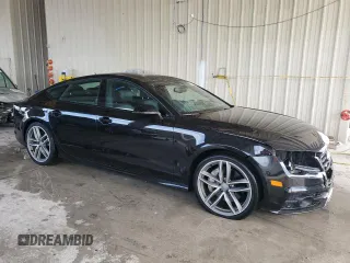 2015 Audi A7 3.0 Prestige with VIN WAU2GAFCXFN011804, listed as a Copart auction lot 67521504 with 129,734 mi miles and Salvage Title. Bid and sale history available at carsss.com. Image 4.