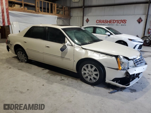 2009 Cadillac DTS 1SC z VIN 1G6KD57Y59U118737, wystawiony jako Copart lot #80776524 z przebiegiem 123 001 mil mil oraz Szkoda całkowita • Salvage title. Historia ofert i sprzedaży dostępna na DreamBid. Obrazek 4.