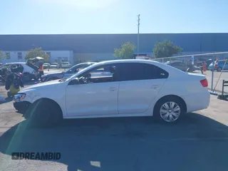 2012 Volkswagen Jetta Sedan S w/Sunroof with VIN 3VW2K7AJXCM355596, listed as a IAAI auction lot 41642491 with 130,937 mi miles. Bid and sale history available at carsss.com. Image 15.