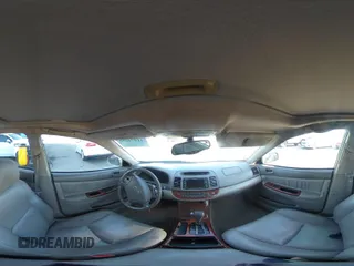 2005 Toyota Camry LE with VIN 4T1BF32K55U592479, listed as a IAAI auction lot 41974250 with 184,767 mi miles and . Bid and sale history available at DreamBid. Image 18.
