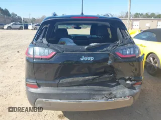 2020 Jeep Cherokee Limited with VIN 1C4PJLDB4LD568404, listed as a IAAI auction lot 41627191 with 91,799 mi miles. Bid and sale history available at carsss.com. Image 6.