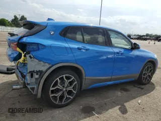 2018 BMW X2 xDrive28i z VIN WBXYJ5C32JEF72801, wystawiony jako Copart lot #56535445 z przebiegiem 45 497 mil mil oraz Szkody całkowita. Historia ofert i sprzedaży dostępna na DreamBid. Obrazek 3.