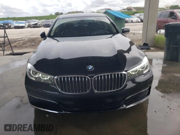 2017 BMW 7 Series 740i with VIN WBA7E2C31HG741176, listed as a Copart auction lot 65698233 with 27,332 mi miles. Bid and sale history available at carsss.com. Image 5.