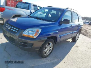 2005 Kia Sportage LX with VIN KNDJF723157097517, listed as a IAAI auction lot 41485759 with 207,294 mi miles and . Bid and sale history available at carsss.com. Image 2.
