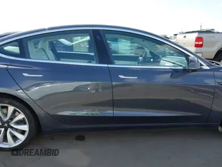 2018 Tesla Model 3 Long Range Battery with VIN 5YJ3E1EA5JF169097, listed as a IAAI auction lot 41916873 with 81,919 mi miles. Bid and sale history available at carsss.com. Image 13.