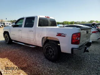 2010 Chevrolet Silverado 1500 LT with VIN 3GCRCSE03AG165766, listed as a Copart auction lot 52150475 with 132,253 mi miles and Salvage Title. Bid and sale history available at DreamBid. Image 2.