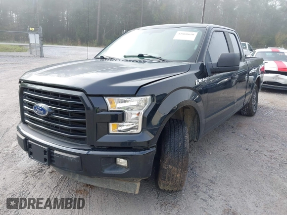 2015 Ford F-150 XL with VIN 1FTEX1CF2FKD12874, listed as a IAAI auction lot 41860610 with 242,215 mi miles. Bid and sale history available at carsss.com. Image 18.