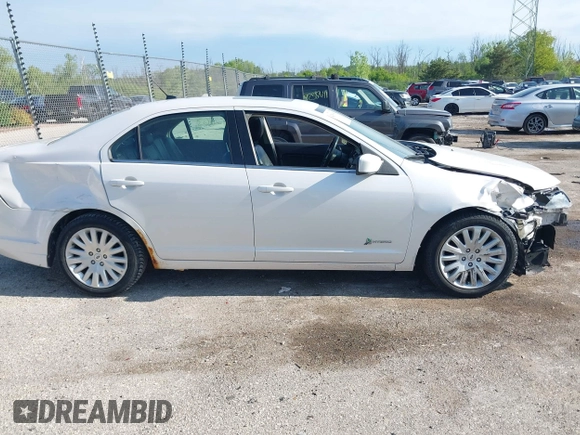 2012 Ford Fusion Hybrid with VIN 3FADP0L38CR255511, listed as a IAAI auction lot 42381063 with 82,083 mi miles and . Bid and sale history available at DreamBid. Image 14.
