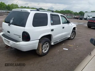 2003 Dodge Durango SLT z VIN 1D4HS48N63F597227, wystawiony jako IAAI lot #42376919 z przebiegiem 291 371 mil mil oraz . Historia ofert i sprzedaży dostępna na DreamBid. Obrazek 4.
