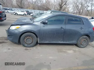 2009 Toyota Matrix with VIN 2T1KU40E79C163666, listed as a IAAI auction lot 41708972 with 182,808 mi miles and . Bid and sale history available at carsss.com. Image 14.