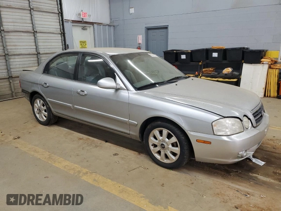 2005 Kia Optima LX z VIN KNAGD128155423463, wystawiony jako Copart lot #87441284 z przebiegiem 143 193 mil mil oraz Szkoda całkowita • Salvage title. Historia ofert i sprzedaży dostępna na DreamBid. Obrazek 4.