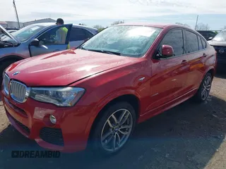 2016 BMW X4 xDrive28i z VIN 5UXXW3C52G0R20677, wystawiony jako IAAI lot #42085953 z przebiegiem 88 000 mil mil oraz . Historia ofert i sprzedaży dostępna na DreamBid. Obrazek 2.