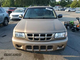 2001 Isuzu Rodeo S with VIN 4S2CK58W314334096, listed as a Copart auction lot 68262924 with 140,657 mi miles and Salvage Title. Bid and sale history available at DreamBid. Image 5.