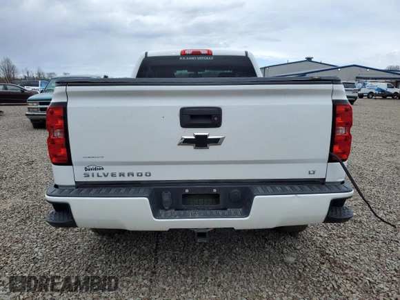 2017 Chevrolet Silverado 1500 LT with VIN 1GCVKREC3HZ216455, listed as a Copart auction lot 52576385 with 73,528 mi miles and Salvage Title. Bid and sale history available at DreamBid. Image 6.